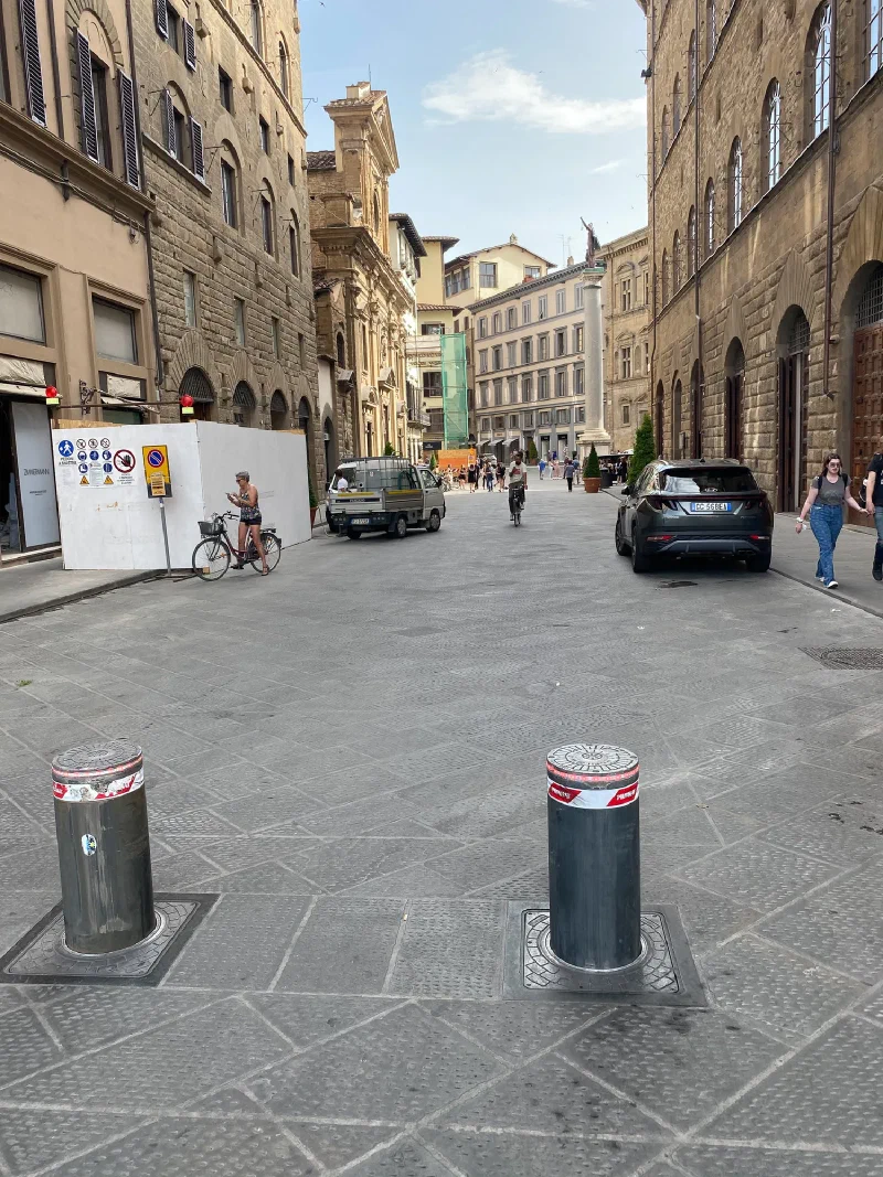 Retractable bollards on a Florence street