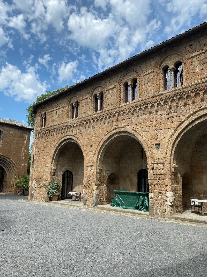 Romanesque facade of La Badia with arched loggia
