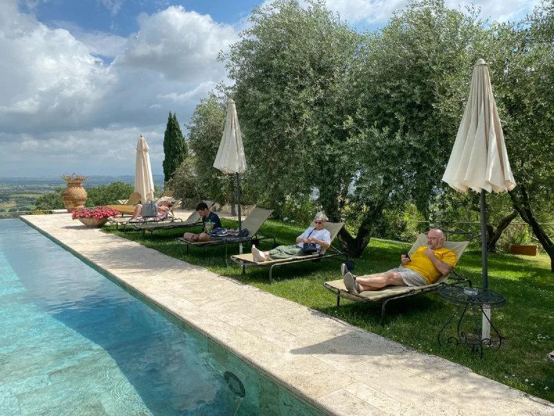 Infinity pool at Villa Cicolina with Tuscan valley views