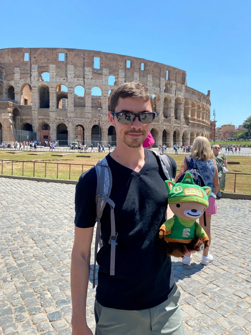 Sumi Bear in front of the Colosseum exterior