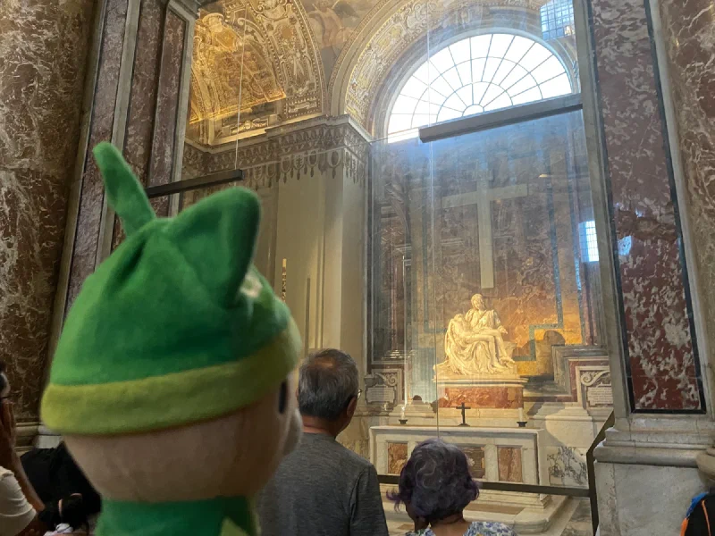 Michelangelo's Pietà behind glass in St. Peter's