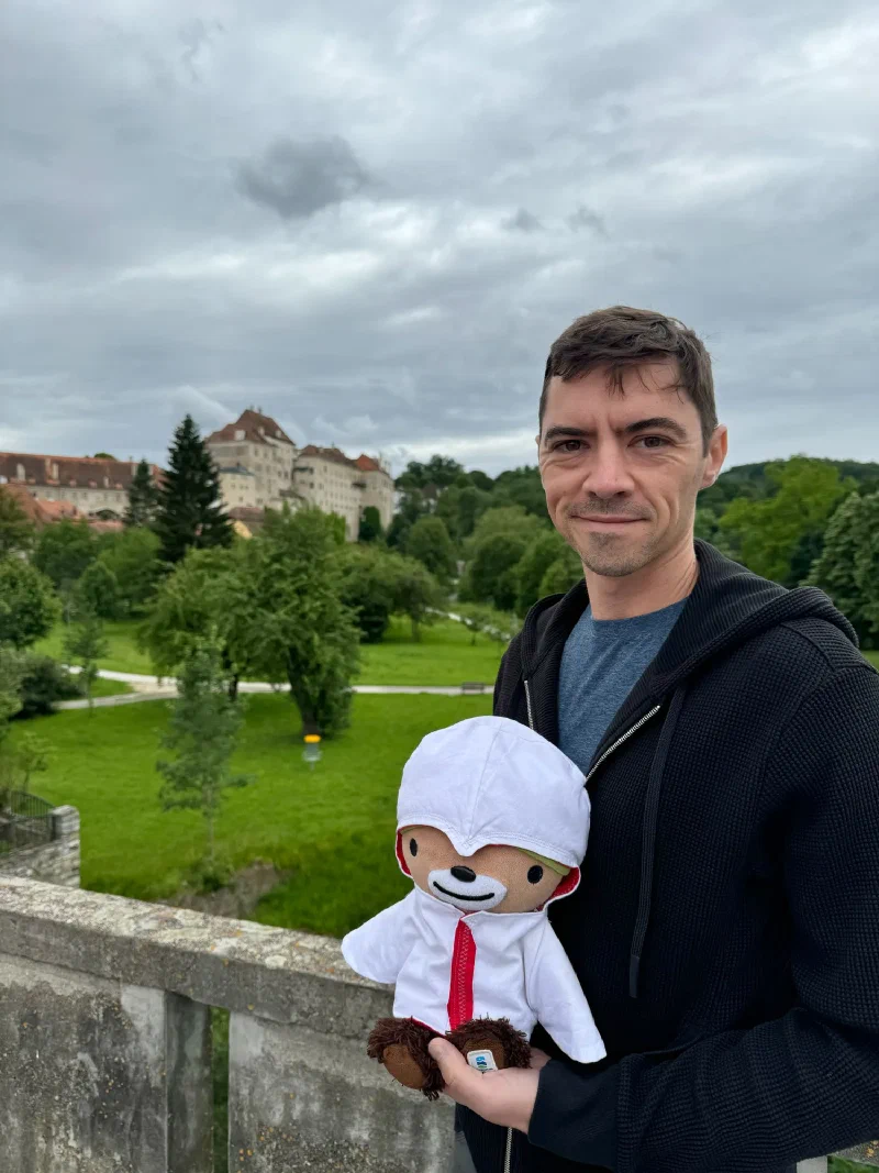 Nicholas and Sumi Bear with the castle in the background