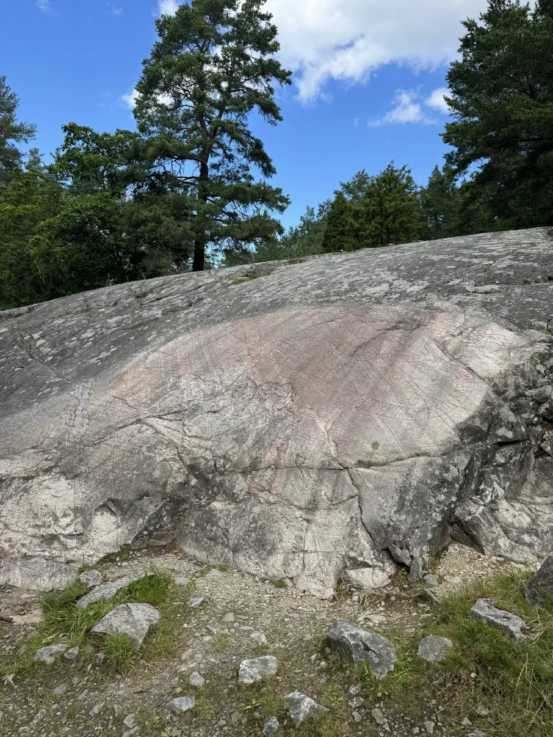The Sigurdsristningen rock carving with red-painted Norse imagery