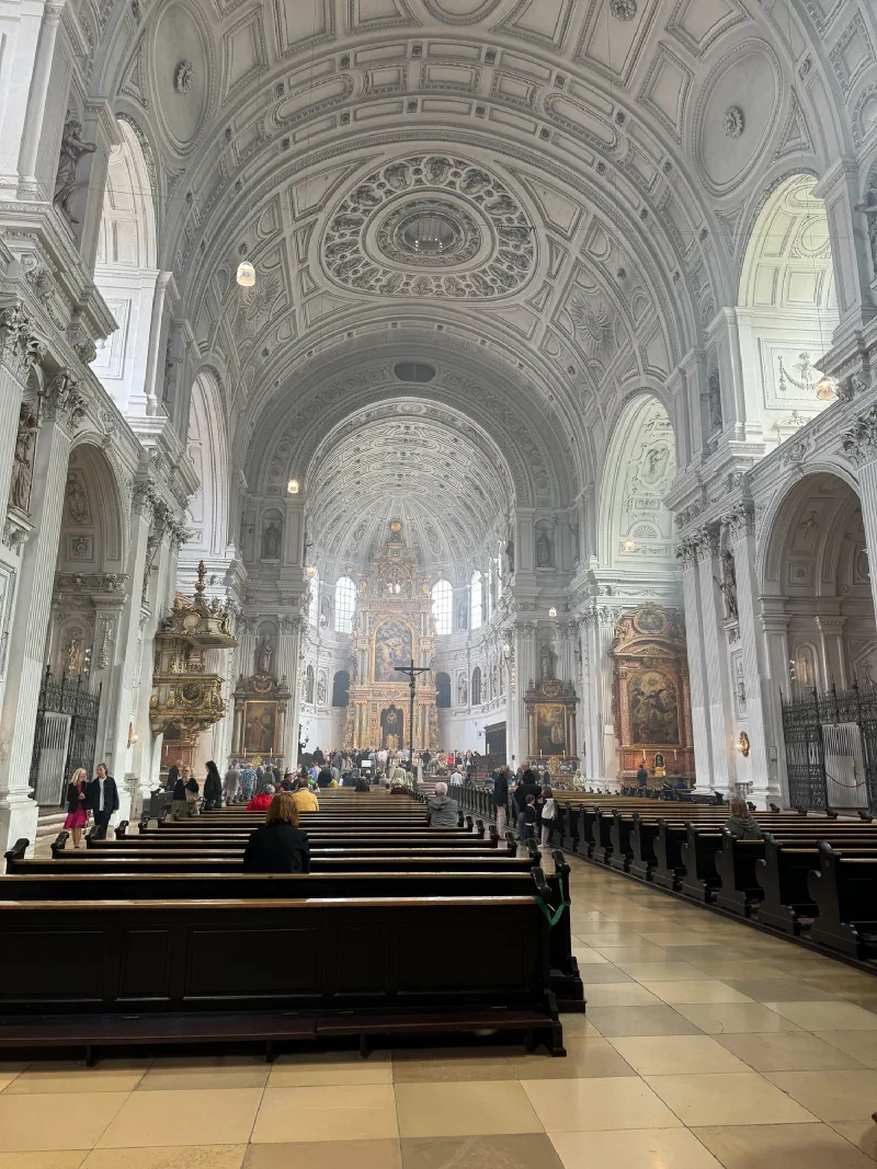 Interior of St. Michael's Church with long nave and ornate altar