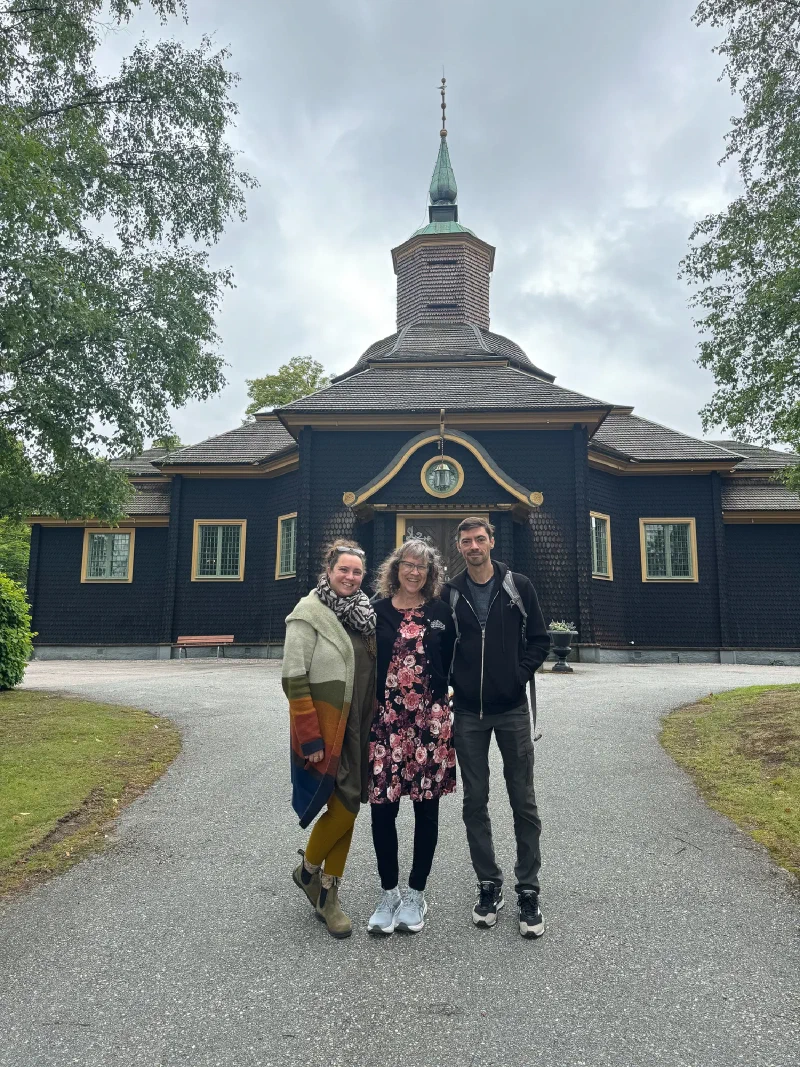 Anna, Nicholas's mom, and Nicholas outside the church
