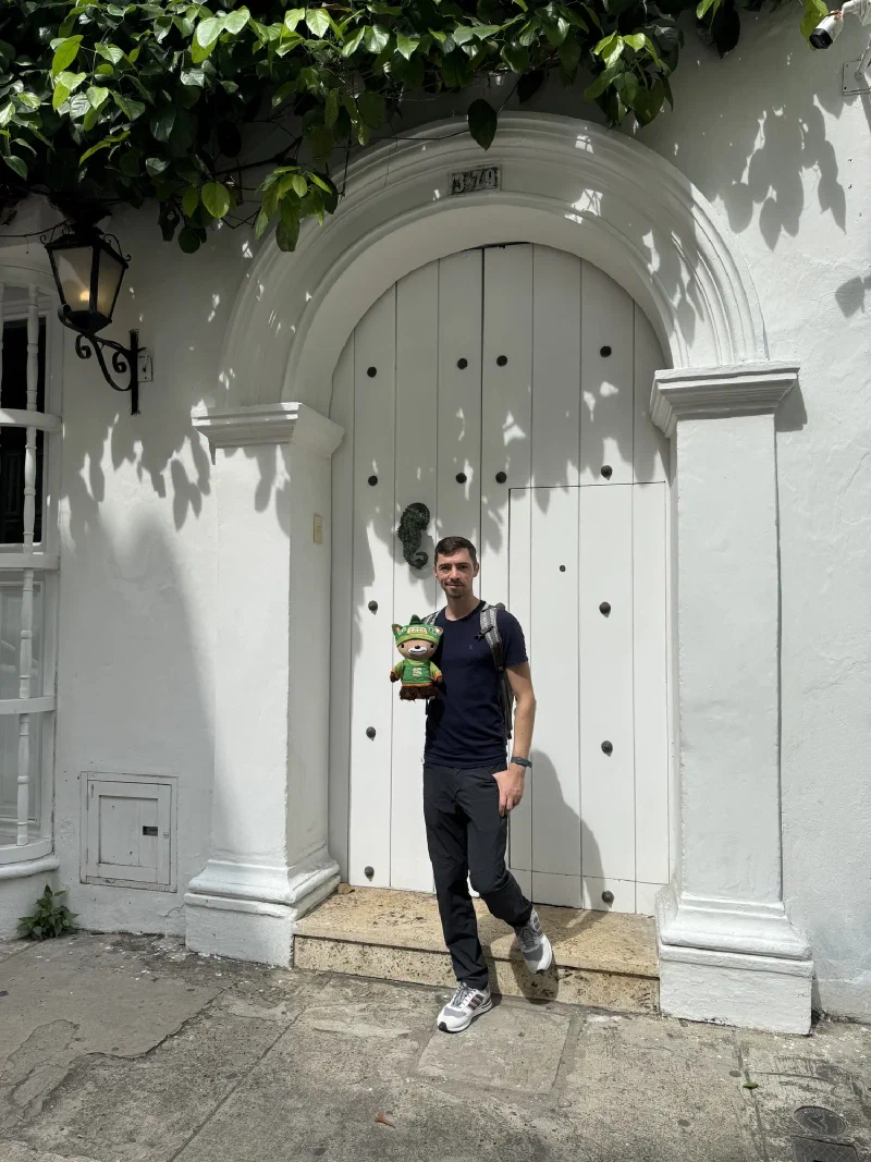 Nicholas and me in front of a white colonial door