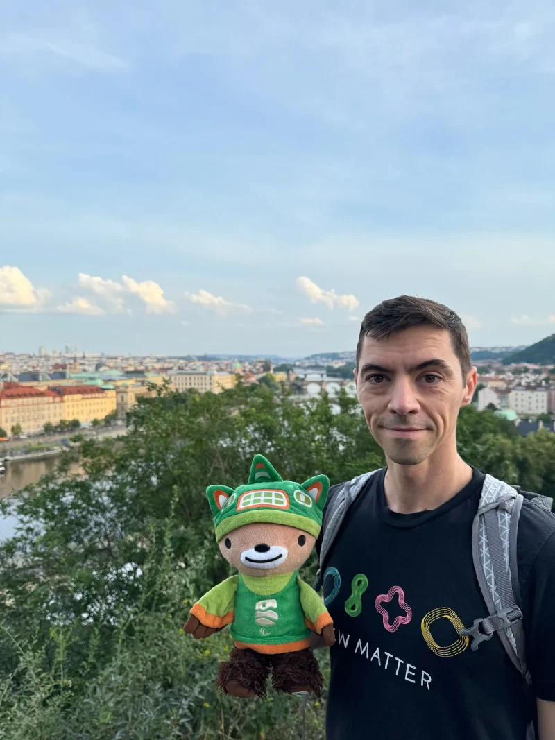 Nicholas and Sumi Bear overlooking Prague bridges