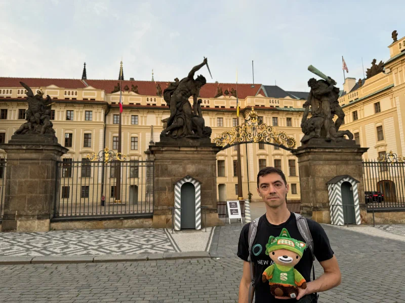 Nicholas and Sumi Bear at the Prague Castle gate