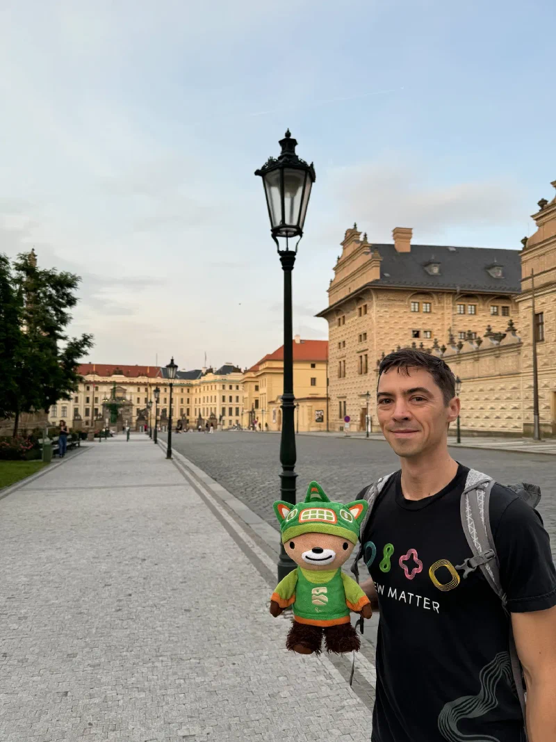 Nicholas with Sumi Bear in the castle area at golden hour