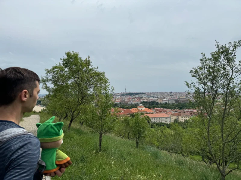 Nicholas and Sumi Bear on the hillside overlooking Prague