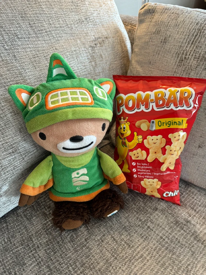 Sumi Bear with a bag of Pom-Bar bear-shaped chips