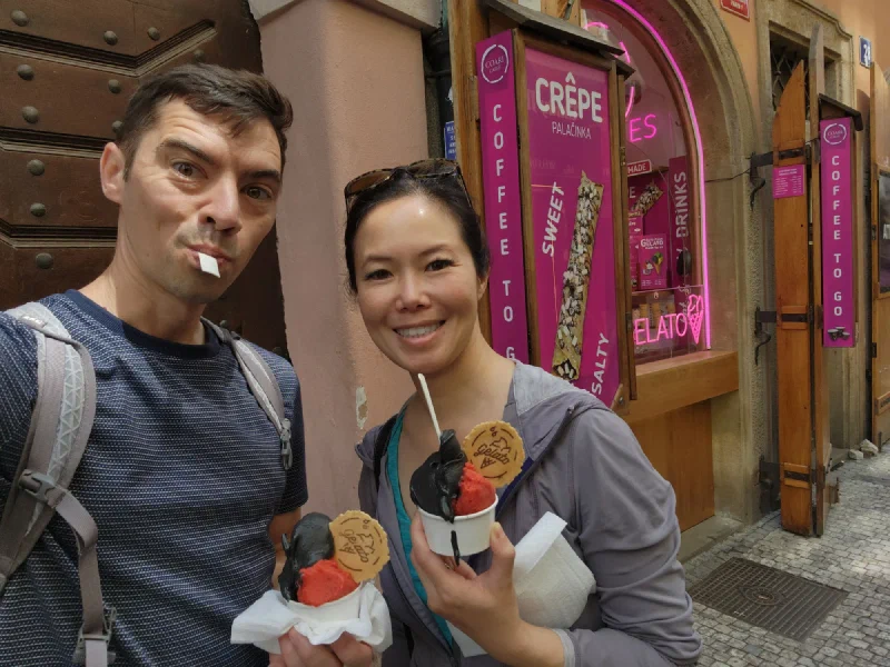 Nicholas and Pokin eating gelato on a Prague street