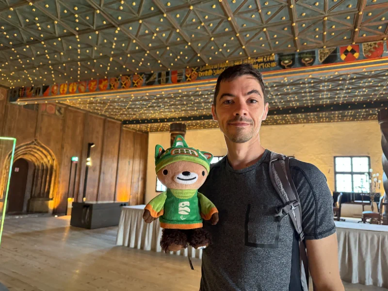 The Golden Hall of Hohensalzburg Fortress with blue and gold starry ceiling and Gothic paneling