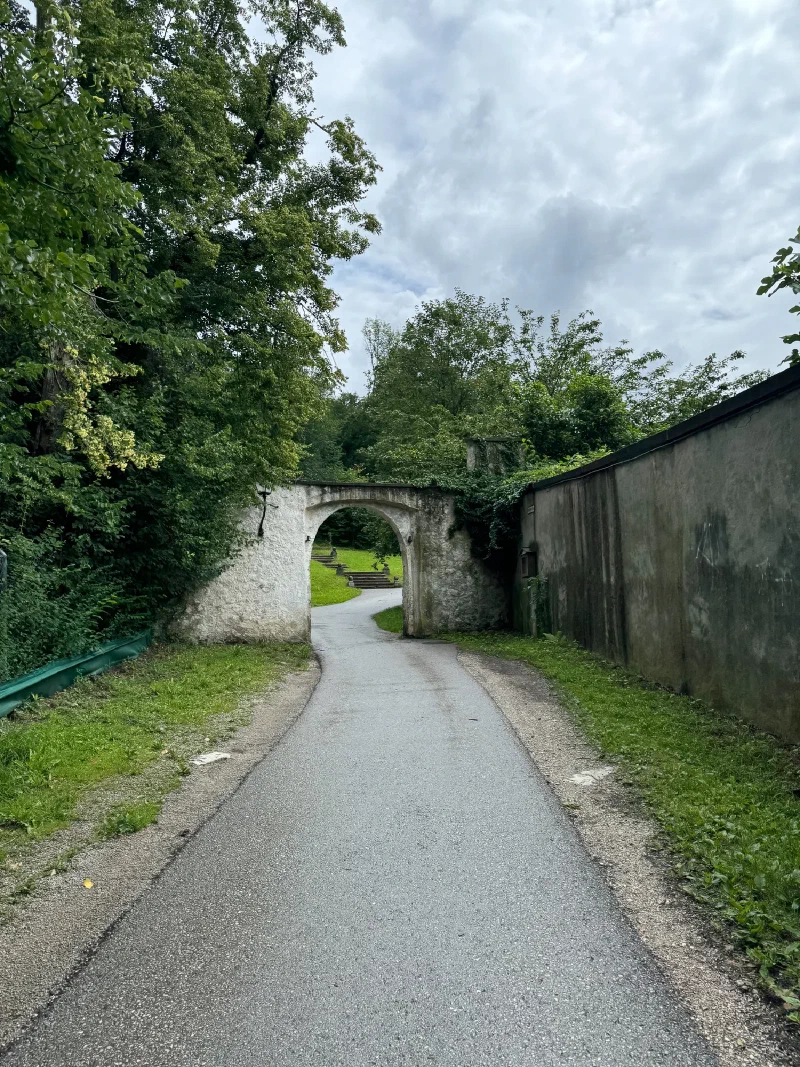 Stone archway entrance on the hillside