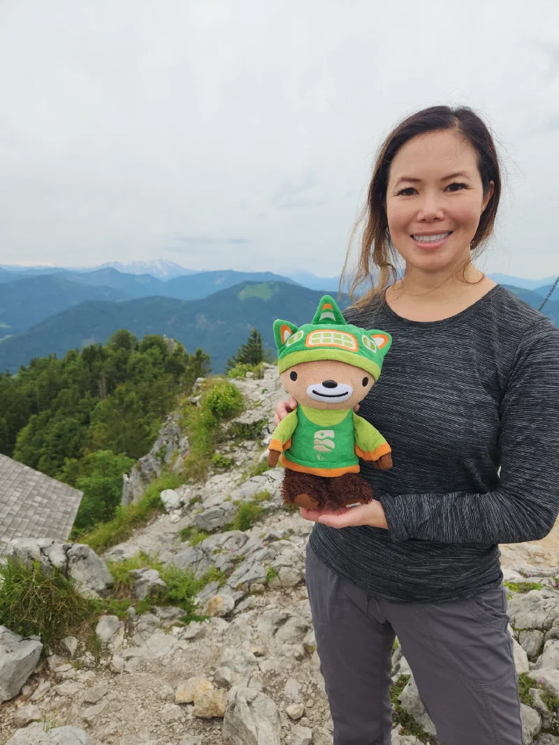 Summit portrait with Sumi and layered mountain ridges