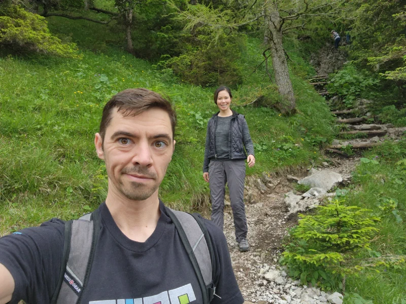 Nicholas on the descent trail through forest