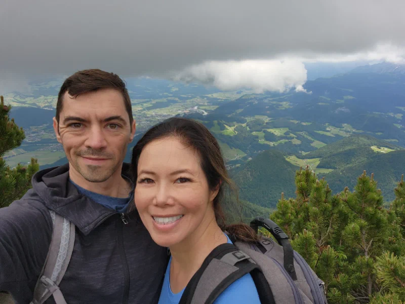 Selfie with dramatic clearing in the clouds and valley below
