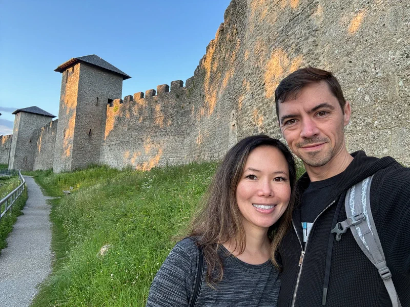 Couple selfie along the outer fortress wall at golden hour