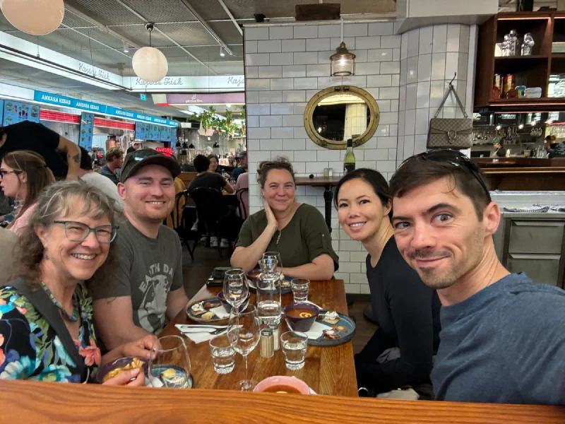 Family group selfie at Hötorgshallen market lunch