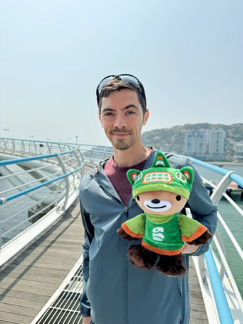 Sumi on a boardwalk over the ocean