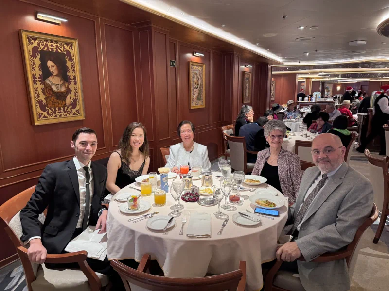 Group of five at formal dinner on the cruise ship