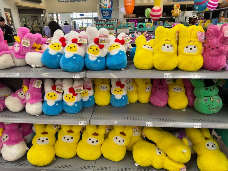 A store shelf full of Peeps plush toys