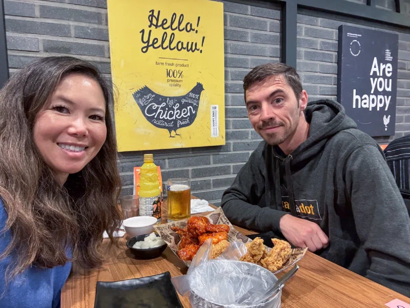 Nicholas and Pokin with Korean fried chicken and beer