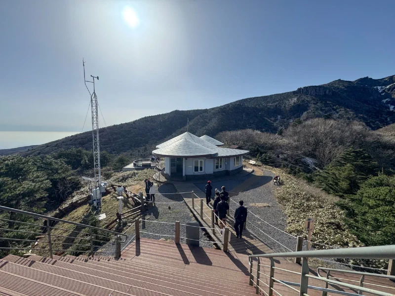 Mountain shelter station with weather monitoring equipment