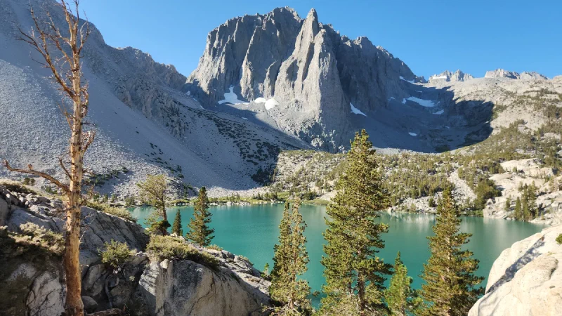 Turquoise lake with Temple Crag rising behind