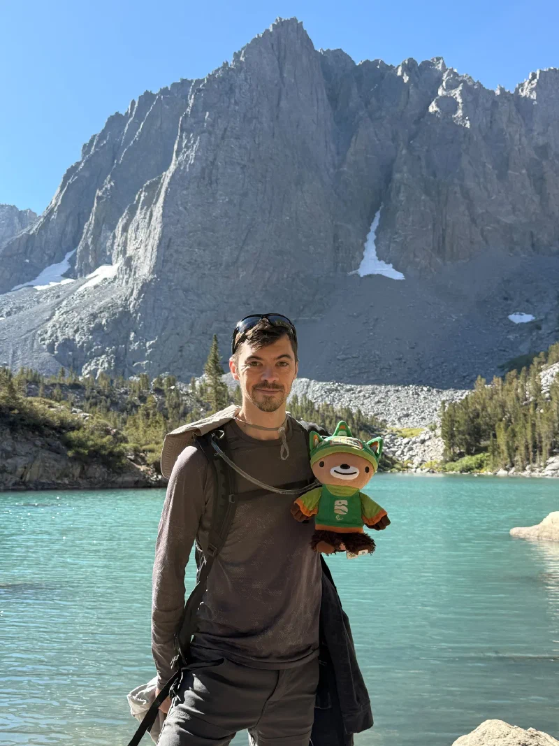 Nicholas holding Sumi at the lake