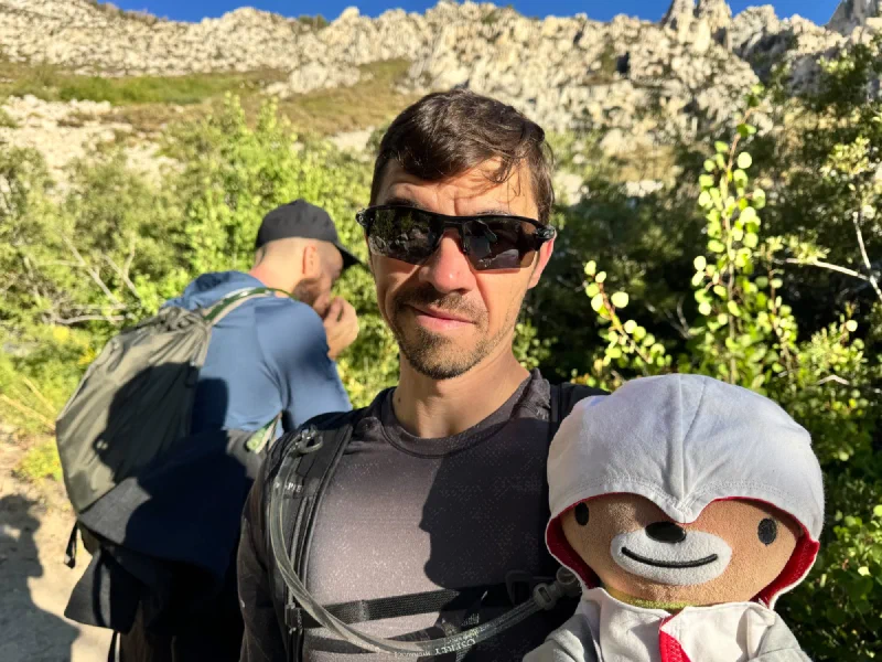 Nicholas holding Sumi on the trail