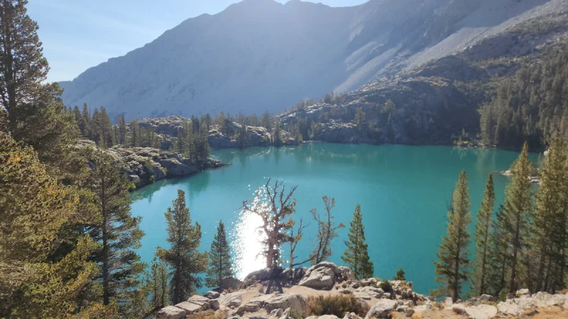Turquoise glacial lake sparkling in the sun