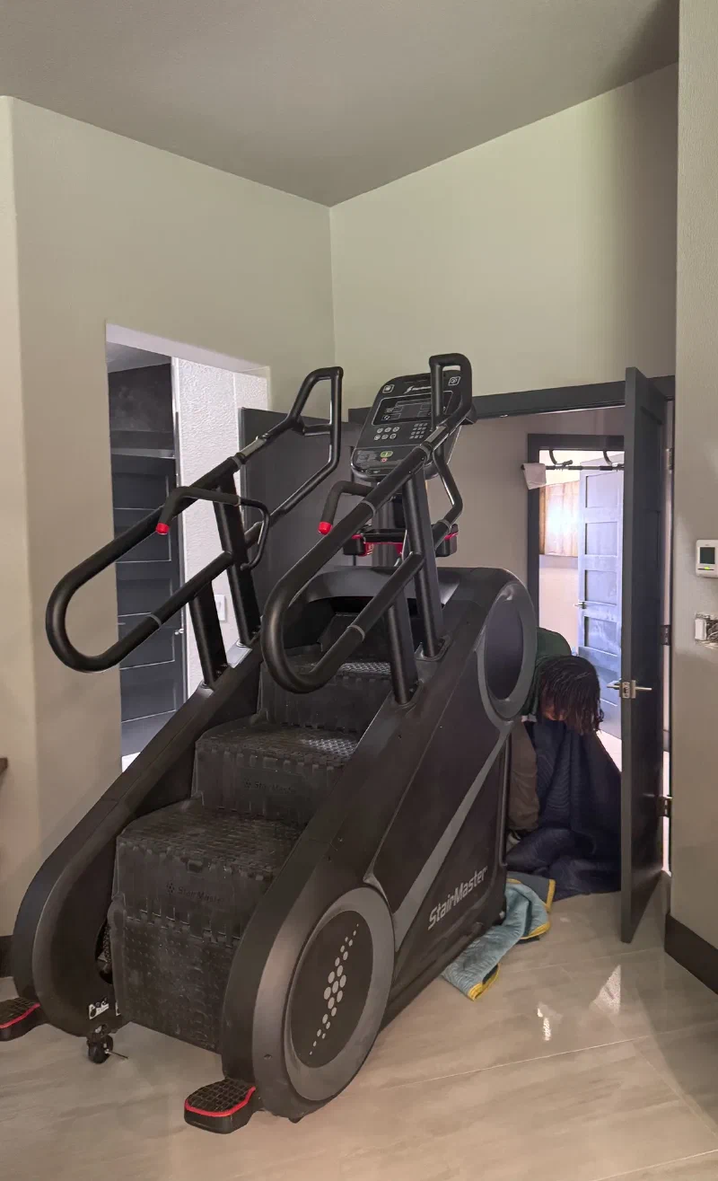 A massive StairMaster installed in the bedroom