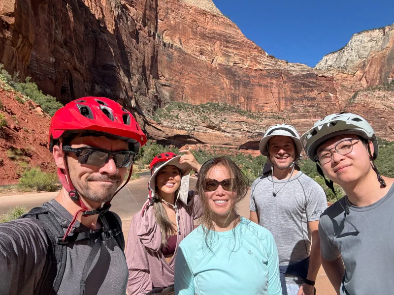 Group with bike helmets in Zion