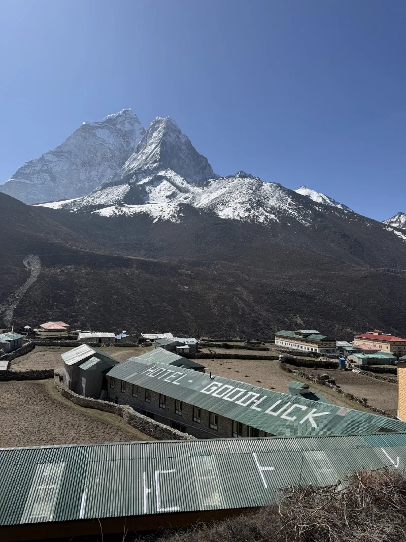 View of Dingboche village from above with Ama Dablam behind