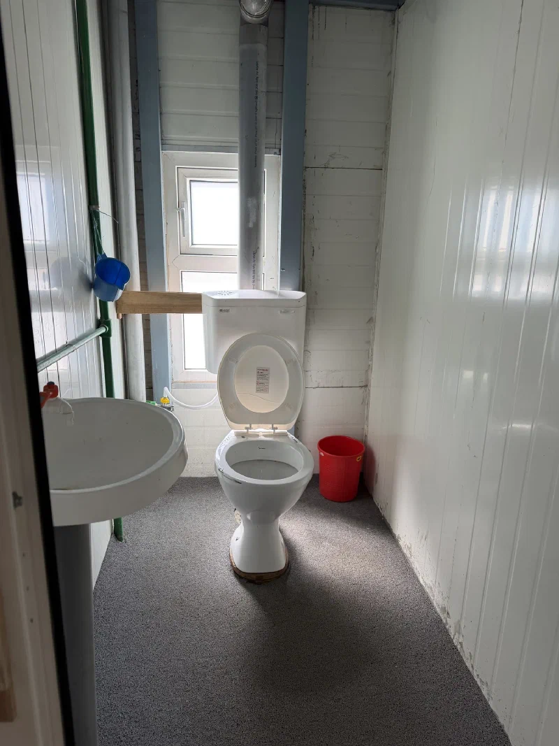 Lodge bathroom with toilet and sink