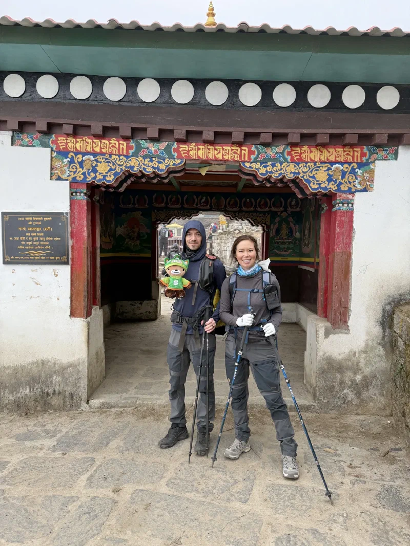 Nicholas and Alice posing at the Namche entrance kani gate