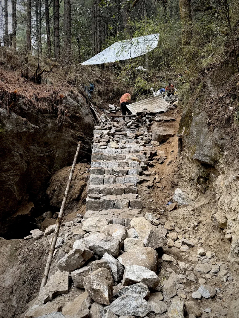 Trail workers repairing landslide damage on the path to Namche
