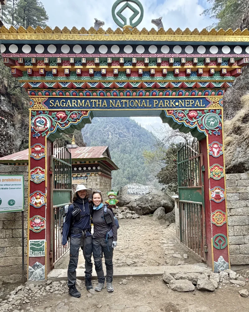 Nicholas and Pokin with Sumi at the national park entrance