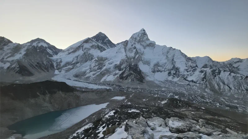 Panoramic view of Everest and frozen Gorak Shep lake
