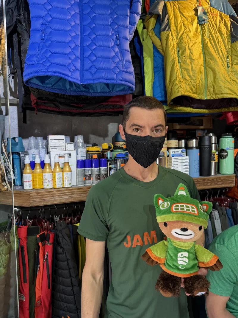 Sumi and Nicholas inside the gear shop