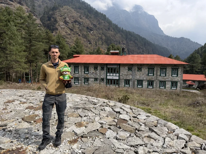 Nicholas and Sumi in front of the Himalayan Sherpa Hospital in Phakding