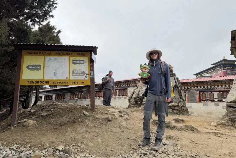 Nicholas and Sumi at the Sagarmatha National Park sign