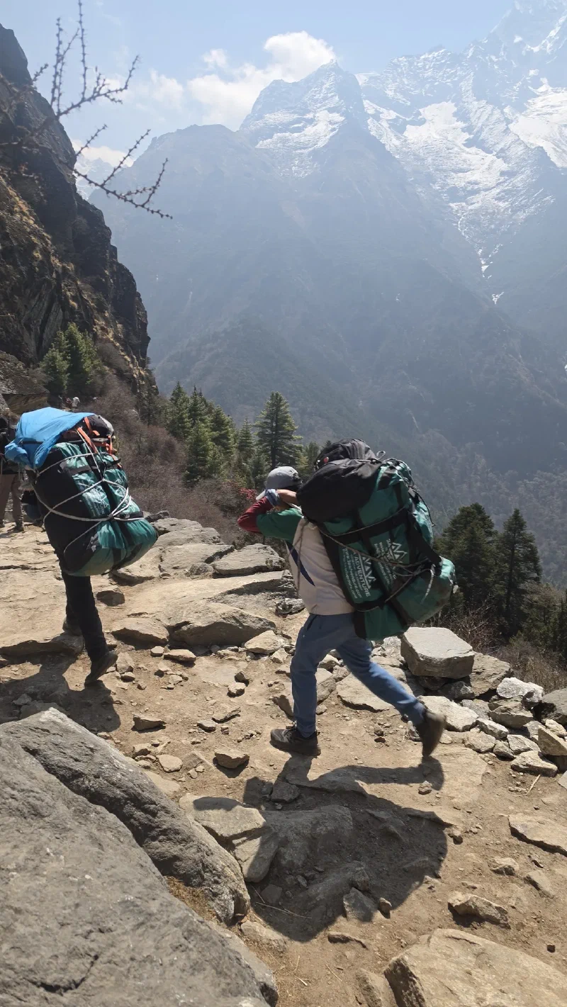 Our two porters carrying our bags