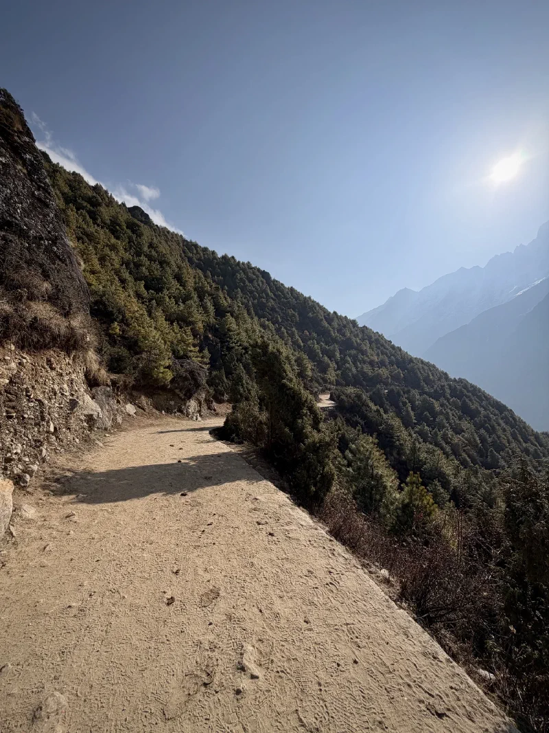 Trail winding through valley