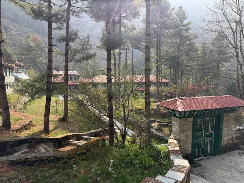 Looking back at Phakding lodges from the trail above