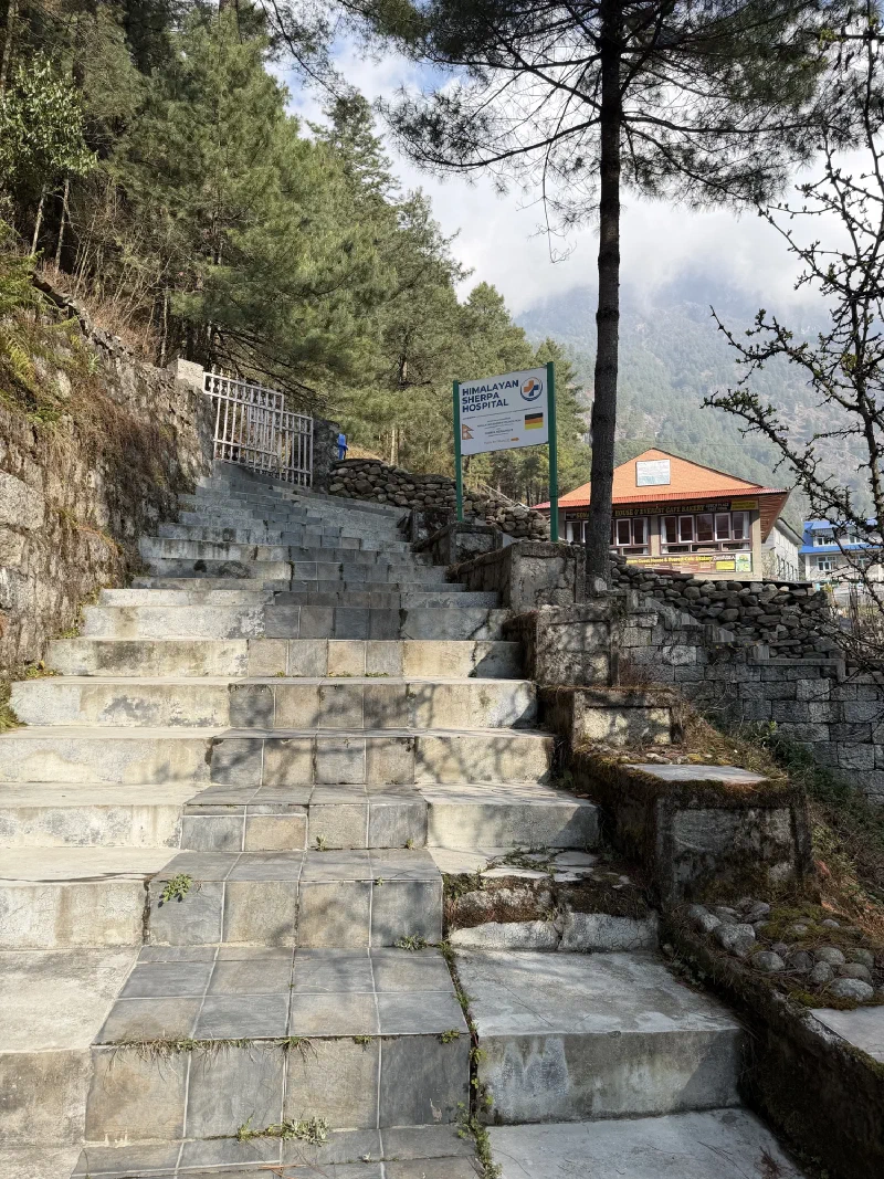 Stone stairs and the Himalayan Sherpa Hospital sign