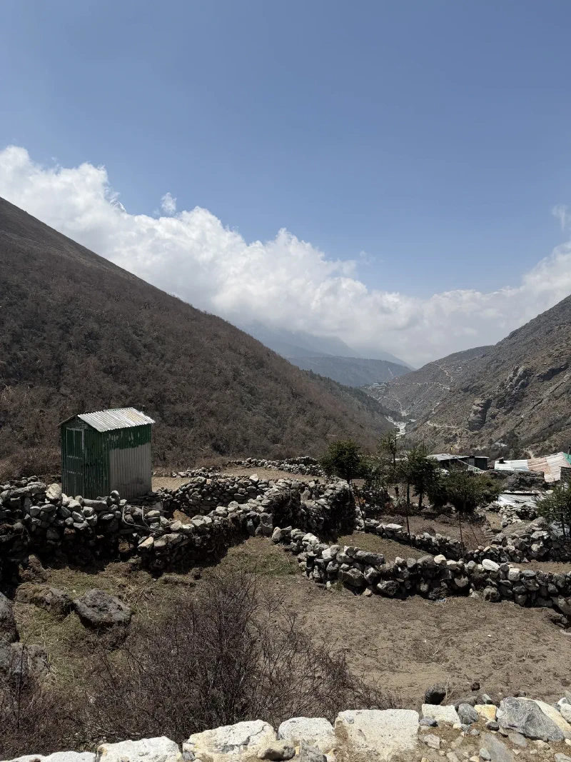 Looking back down the valley as clouds build