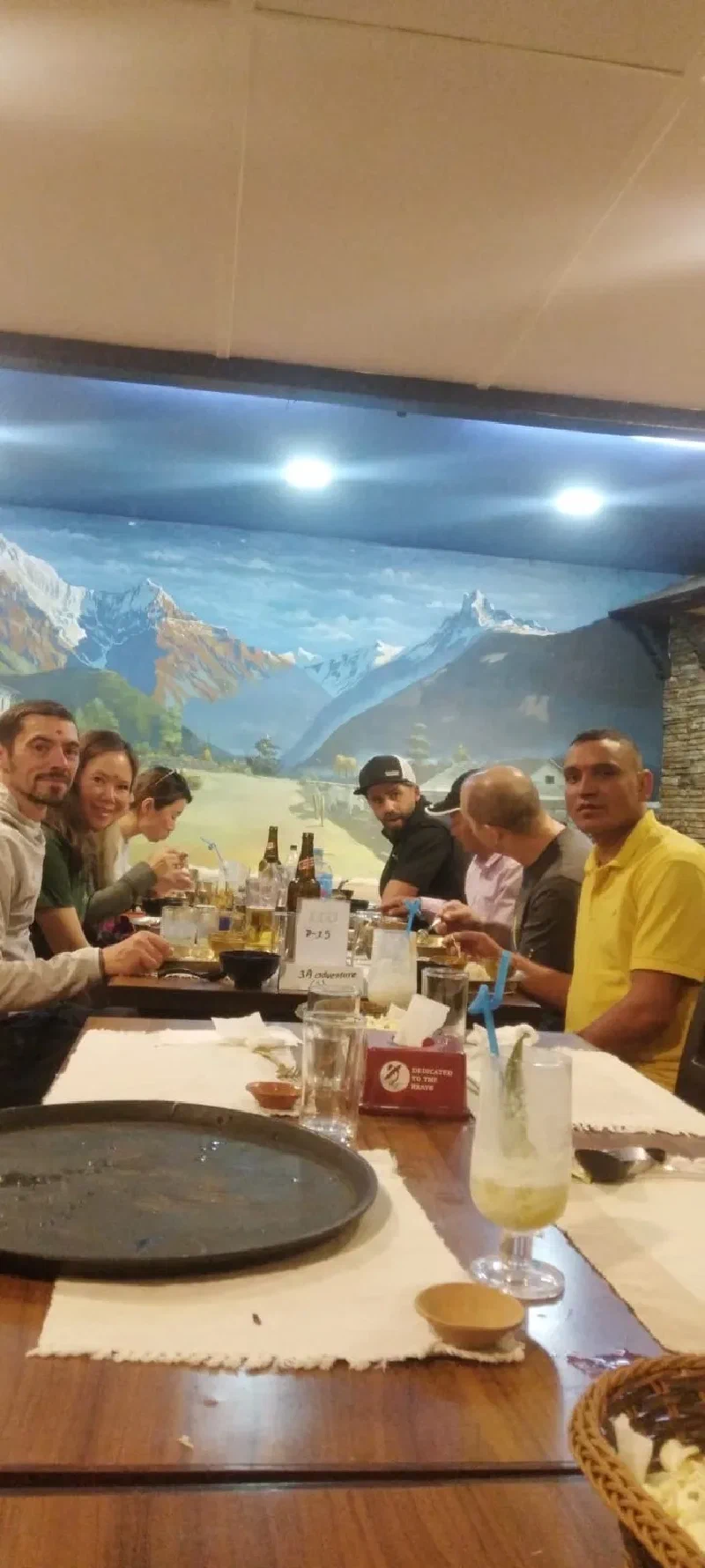 The cultural dinner-and-show restaurant with a stage and mountain backdrop