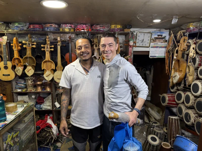Ashish customizing a drum for Nicholas